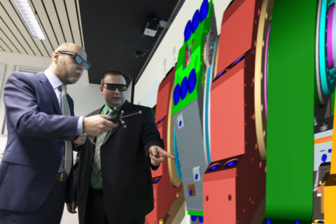 Dr. Stefan Tremmel and David Hochrein at the test stand where the rolling bearings’ behaviour can be simulated and optimised even before a prototype is built. (Image: Schaeffler)